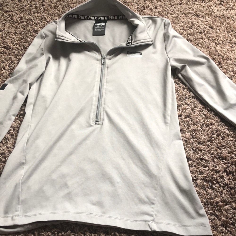 gray half way zip up athletic jacket